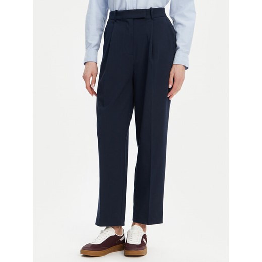 Tommy Hilfiger Chinosy WW0WW44793 Granatowy Tapered Fit ze sklepu MODIVO w kategorii Spodnie damskie - zdjęcie 181143398