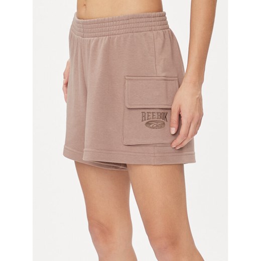 Reebok Szorty sportowe Archive Essentials IL6288 Beżowy Regular Fit ze sklepu MODIVO w kategorii Szorty - zdjęcie 181154689