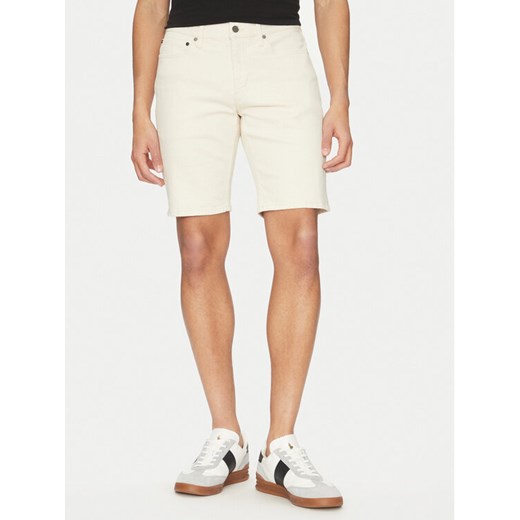 Calvin Klein Szorty jeansowe K10K114078 Écru Slim Fit ze sklepu MODIVO w kategorii Spodenki męskie - zdjęcie 181173456