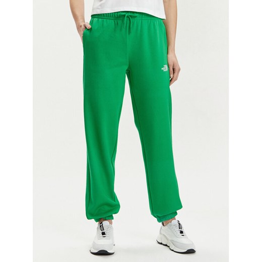 The North Face Spodnie dresowe Essential NF0A7ZJF Zielony Relaxed Fit ze sklepu MODIVO w kategorii Spodnie damskie - zdjęcie 181180297