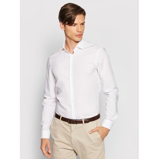 Calvin Klein Koszula 2ply Poplin Stretch Slim Shirt K10K103025 Biały Slim Fit ze sklepu MODIVO w kategorii Koszule męskie - zdjęcie 181183398