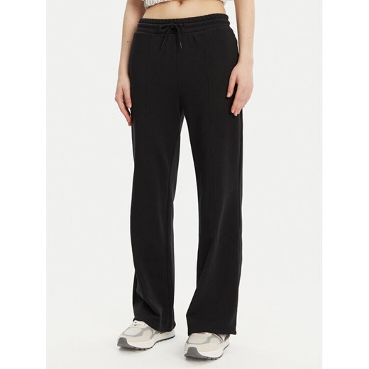 Converse Spodnie dresowe 10028418-A03 Czarny Wide Leg ze sklepu MODIVO w kategorii Spodnie damskie - zdjęcie 181194278