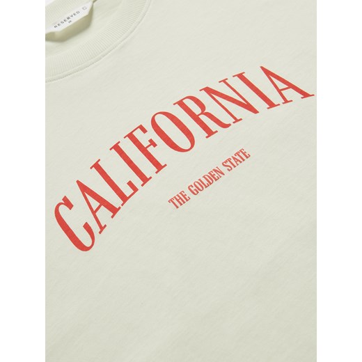 T-shirt męski Reserved biały w nadruki młodzieżowy 