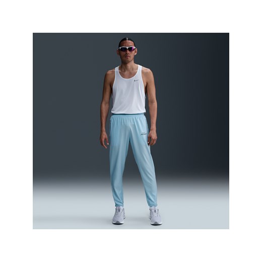 Męskie spodnie do biegania z tkaniny Dri-FIT Nike Challenger Flash - Niebieski ze sklepu Nike poland w kategorii Spodnie męskie - zdjęcie 181235736