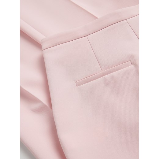 Reserved - Spodnie z kantem - pastelowy róż Reserved L Reserved