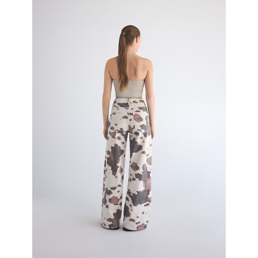 Reserved - Jeansy wide leg ze zwierzęcym wzorem - wielobarwny Reserved 44 Reserved