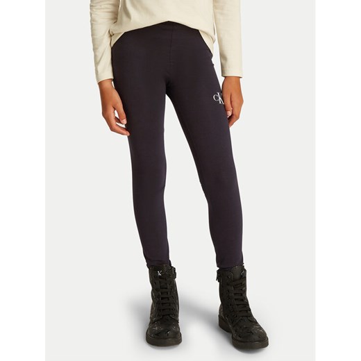 Calvin Klein Jeans Legginsy IG0IG02137 D Czarny Slim Fit ze sklepu MODIVO w kategorii Spodnie dziewczęce - zdjęcie 182594027