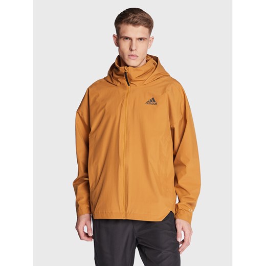 adidas Kurtka przejściowa Traveer RAIN.RDY Jacket (Gender Neutral) HG6013 Beżowy Regular Fit ze sklepu MODIVO w kategorii Kurtki męskie - zdjęcie 182594275