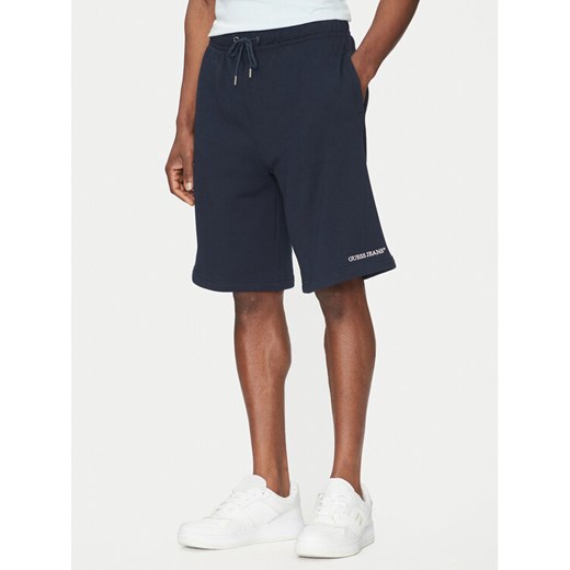 Guess Jeans Szorty sportowe M5GD49 KCPR1 Granatowy Regular Fit ze sklepu MODIVO w kategorii Spodenki męskie - zdjęcie 182594657