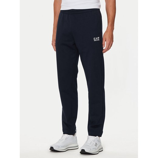 EA7 Emporio Armani Spodnie dresowe 8NPP65 PJVRZ 1562 Granatowy Regular Fit ze sklepu MODIVO w kategorii Spodnie męskie - zdjęcie 182594667