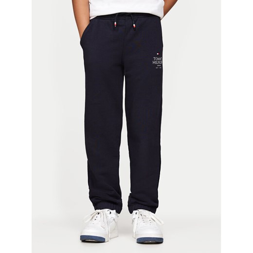 Tommy Hilfiger Spodnie dresowe KB0KB09244 D Granatowy Relaxed Fit ze sklepu MODIVO w kategorii Spodnie chłopięce - zdjęcie 182594865