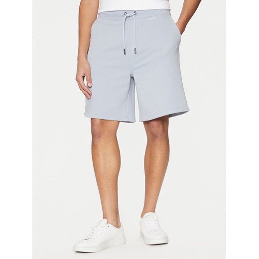 Calvin Klein Szorty sportowe Nano Logo K10K112689 Niebieski Regular Fit ze sklepu MODIVO w kategorii Spodenki męskie - zdjęcie 182595606