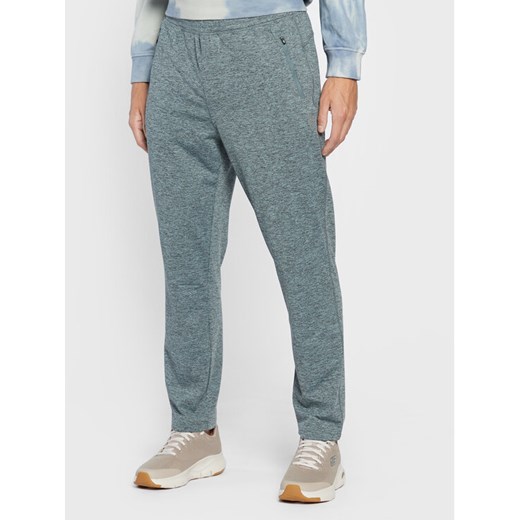 Skechers Spodnie dresowe Ultra Go M1PT77 Niebieski Tapered Fit ze sklepu MODIVO w kategorii Spodnie męskie - zdjęcie 182595857