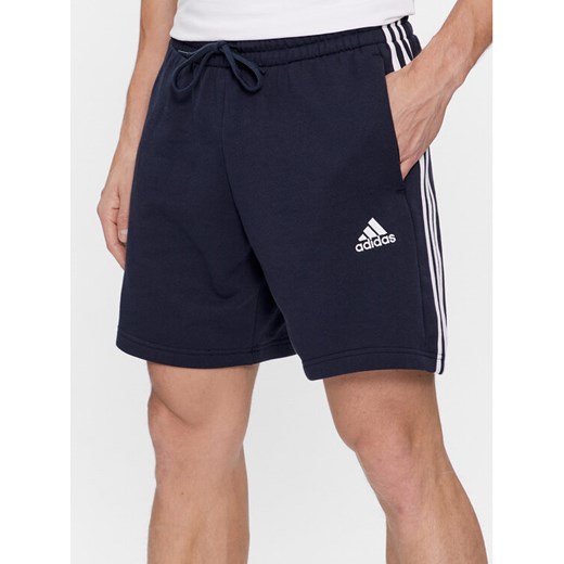adidas Szorty sportowe Essentials French Terry 3-Stripes Shorts IC9436 Niebieski Regular Fit ze sklepu MODIVO w kategorii Spodenki męskie - zdjęcie 182595935