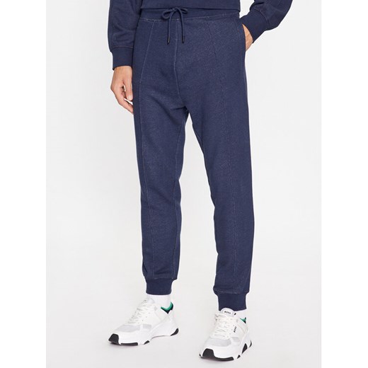 Boss Spodnie dresowe Seglitchstitch 50499275 Granatowy Regular Fit ze sklepu MODIVO w kategorii Spodnie męskie - zdjęcie 182596269