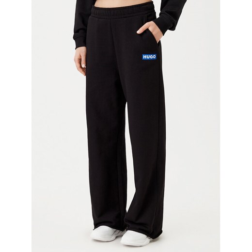 HUGO Spodnie dresowe 50522435 Czarny Relaxed Fit ze sklepu MODIVO w kategorii Spodnie damskie - zdjęcie 182596457