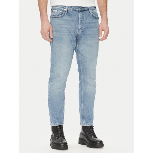Calvin Klein Jeans Jeansy J30J327174 Niebieski Tapered Fit ze sklepu MODIVO w kategorii Jeansy męskie - zdjęcie 182596459