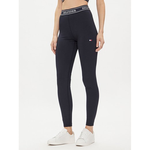 Tommy Hilfiger Legginsy Monotype WW0WW41512 Granatowy Slim Fit ze sklepu MODIVO w kategorii Spodnie damskie - zdjęcie 182597349