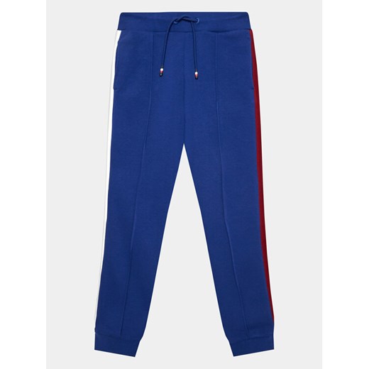 Tommy Hilfiger Spodnie dresowe Globral Stripes KB0KB08404 D Niebieski Regular Fit ze sklepu MODIVO w kategorii Spodnie chłopięce - zdjęcie 182597435