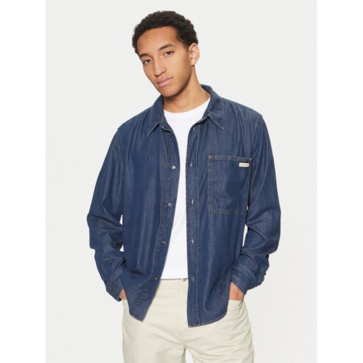 Calvin Klein Jeans Koszula jeansowa J30J327022 Granatowy Regular Fit ze sklepu MODIVO w kategorii Koszule męskie - zdjęcie 182597916