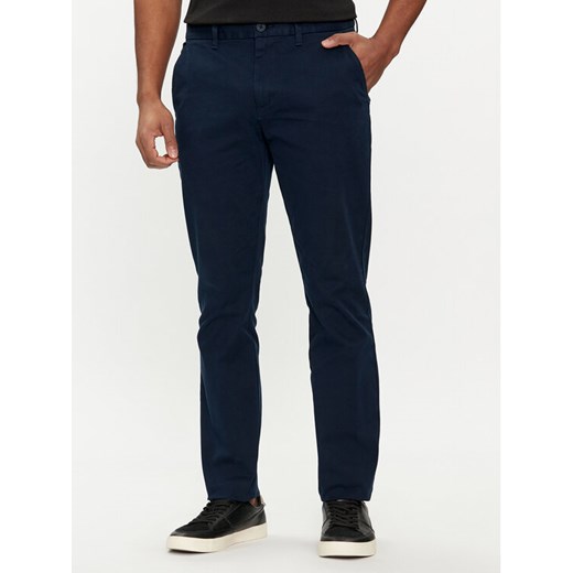 Tommy Jeans Chinosy Austin DM0DM19166 Granatowy Slim Fit ze sklepu MODIVO w kategorii Spodnie męskie - zdjęcie 182598748