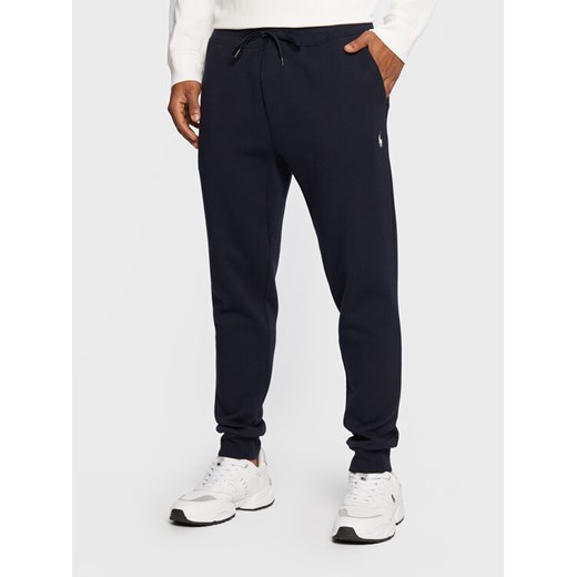 Polo Ralph Lauren Spodnie dresowe 710888283002 Granatowy Regular Fit ze sklepu MODIVO w kategorii Spodnie męskie - zdjęcie 182599017