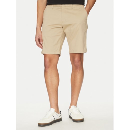 Tommy Hilfiger Szorty materiałowe Harlem MW0MW23568 Beżowy Regular Fit ze sklepu MODIVO w kategorii Spodenki męskie - zdjęcie 182600019