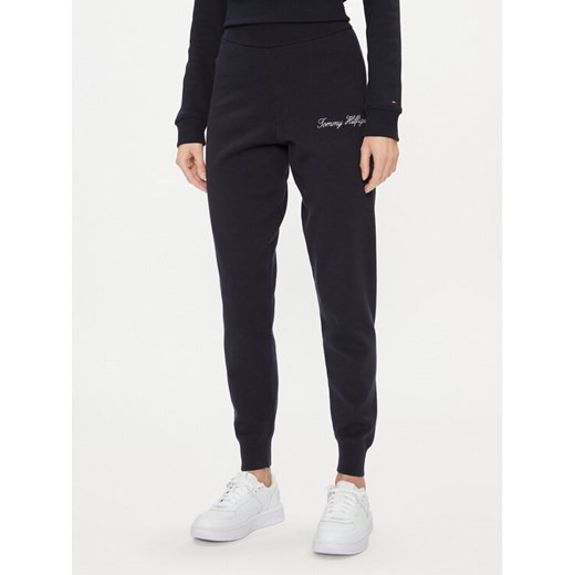 Tommy Hilfiger Spodnie dresowe Script Graphic WW0WW40347 Granatowy Regular Fit ze sklepu MODIVO w kategorii Spodnie damskie - zdjęcie 182601155