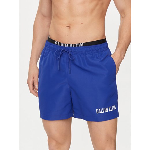 Calvin Klein Swimwear Szorty kąpielowe KM0KM00992 Granatowy Regular Fit ze sklepu MODIVO w kategorii Kąpielówki - zdjęcie 182601276