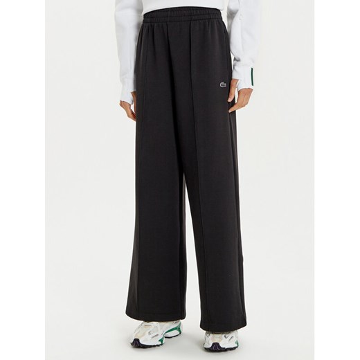 Lacoste Spodnie dresowe XF7374 Czarny Wide Leg ze sklepu MODIVO w kategorii Spodnie damskie - zdjęcie 182602646