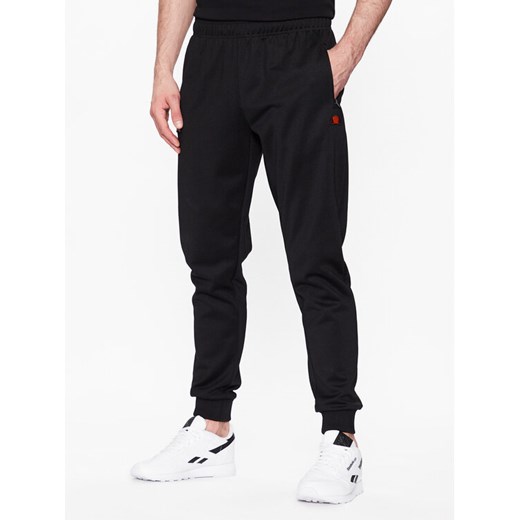 Ellesse Spodnie dresowe Bertoni SHR04351 Czarny Regular Fit ze sklepu MODIVO w kategorii Spodnie męskie - zdjęcie 182602746