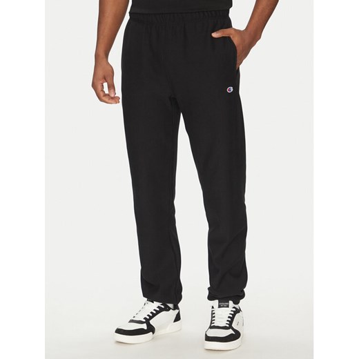 Champion Spodnie dresowe 221620 Czarny Regular Fit ze sklepu MODIVO w kategorii Spodnie męskie - zdjęcie 182602806