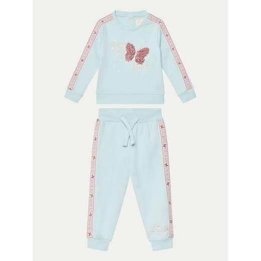 Guess Komplet bluzka i spodnie A5RG19 KA6R4 Niebieski Regular Fit ze sklepu MODIVO w kategorii Komplety niemowlęce - zdjęcie 182603927