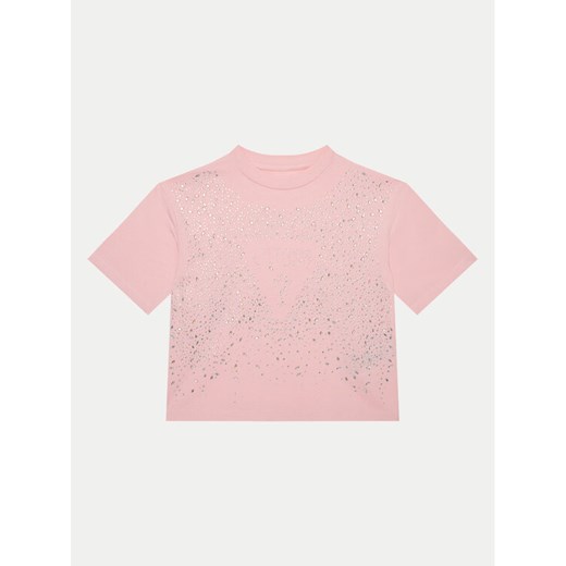 Guess T-Shirt J5RI13 K6YW4 Różowy Boxy Fit ze sklepu MODIVO w kategorii Bluzki dziewczęce - zdjęcie 182605099