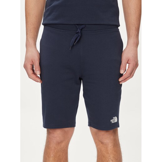 The North Face Szorty sportowe Standard NF0A3S4E Granatowy Regular Fit ze sklepu MODIVO w kategorii Spodenki męskie - zdjęcie 182606027