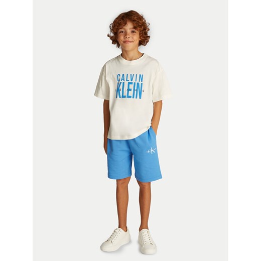 Calvin Klein Jeans T-Shirt Bold Graphic IB0IB02448 Écru Relaxed Fit ze sklepu MODIVO w kategorii T-shirty chłopięce - zdjęcie 182606709