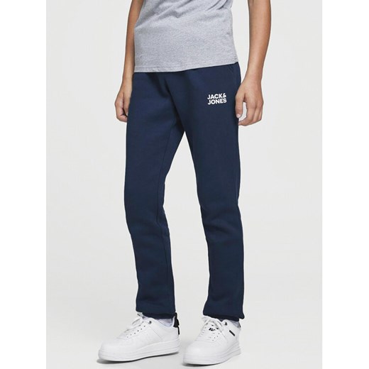 Jack&Jones Junior Spodnie dresowe Gordon 12257312 Granatowy Slim Fit ze sklepu MODIVO w kategorii Spodnie chłopięce - zdjęcie 182607678