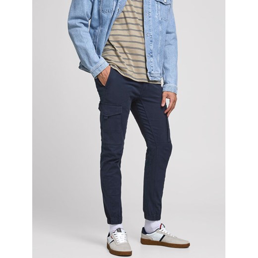 Jack&Jones Spodnie materiałowe Paul 12169582 Granatowy Tapered Fit ze sklepu MODIVO w kategorii Spodnie męskie - zdjęcie 182607979