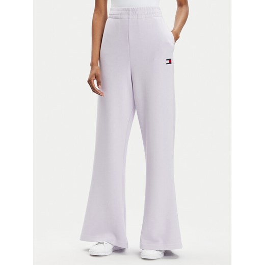 Tommy Jeans Spodnie dresowe DW0DW17312 Fioletowy Wide Leg ze sklepu MODIVO w kategorii Spodnie damskie - zdjęcie 182608959