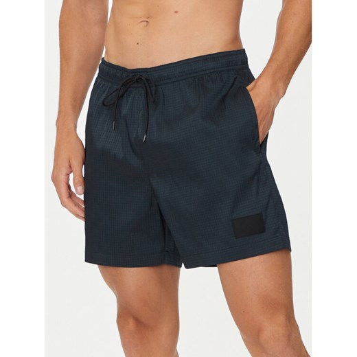 Calvin Klein Swimwear Szorty kąpielowe KM0KM01023 Czarny Regular Fit ze sklepu MODIVO w kategorii Kąpielówki - zdjęcie 182609259