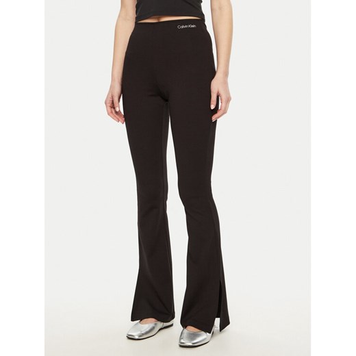 Calvin Klein Jeans Legginsy Milano J20J225089 Czarny Slim Fit ze sklepu MODIVO w kategorii Spodnie damskie - zdjęcie 182609857