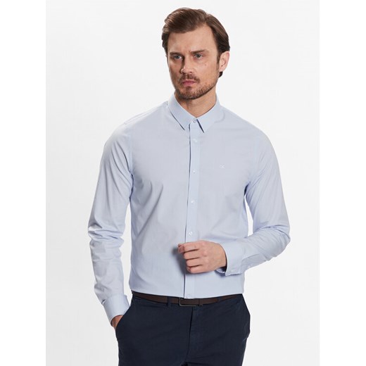 Calvin Klein Koszula K10K110856 Niebieski Slim Fit ze sklepu MODIVO w kategorii Koszule męskie - zdjęcie 182610267