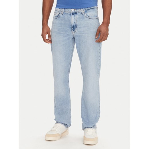 Tommy Jeans Jeansy Ryan DM0DM21024 Niebieski Slim Fit ze sklepu MODIVO w kategorii Jeansy męskie - zdjęcie 182612097