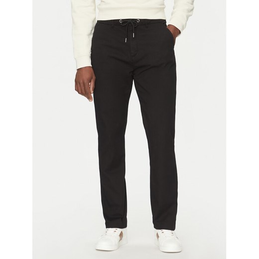 Guess Spodnie materiałowe M5RB51 WGXW1 Czarny Regular Fit ze sklepu MODIVO w kategorii Spodnie męskie - zdjęcie 182613217