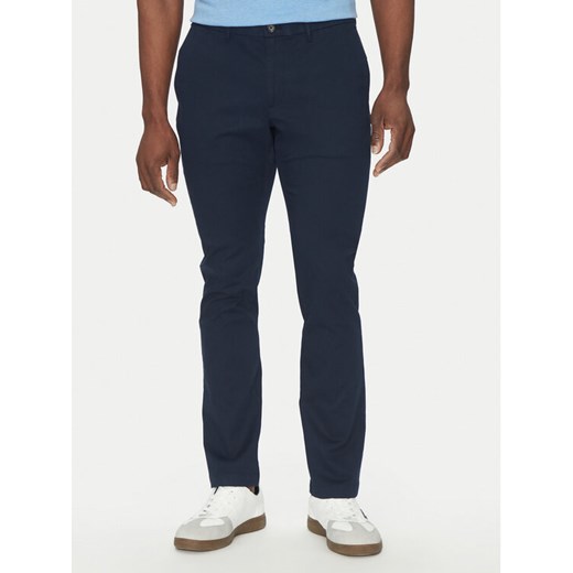 Michael Kors Chinosy CS4301KDR2 Granatowy Slim Fit ze sklepu MODIVO w kategorii Spodnie męskie - zdjęcie 182613646