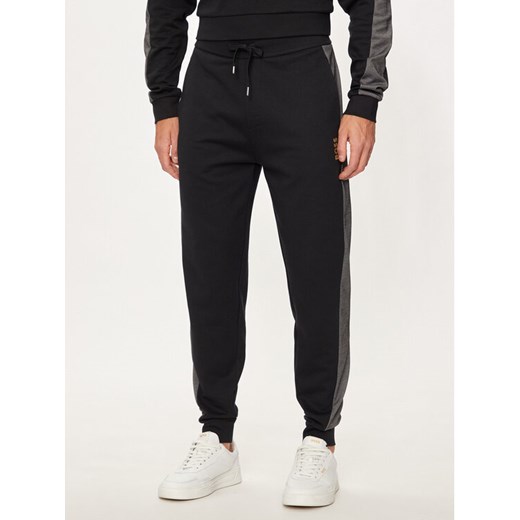 Boss Spodnie dresowe 50527552 Czarny Regular Fit ze sklepu MODIVO w kategorii Spodnie męskie - zdjęcie 182613876