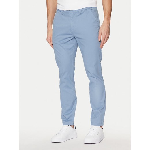 Tommy Jeans Chinosy Austin DM0DM20282 Niebieski Slim Fit ze sklepu MODIVO w kategorii Spodnie męskie - zdjęcie 182615795