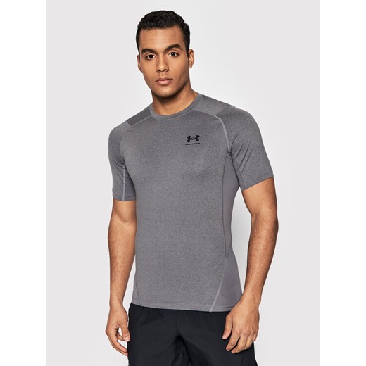 Under Armour Koszulka techniczna HeatGear® 1361518 Szary Slim Fit ze sklepu MODIVO w kategorii T-shirty męskie - zdjęcie 182616637