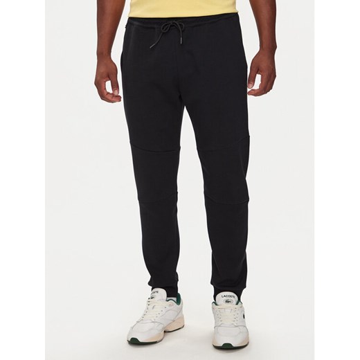 Lacoste Spodnie dresowe XH0011R Czarny Regular Fit ze sklepu MODIVO w kategorii Spodnie męskie - zdjęcie 182617177