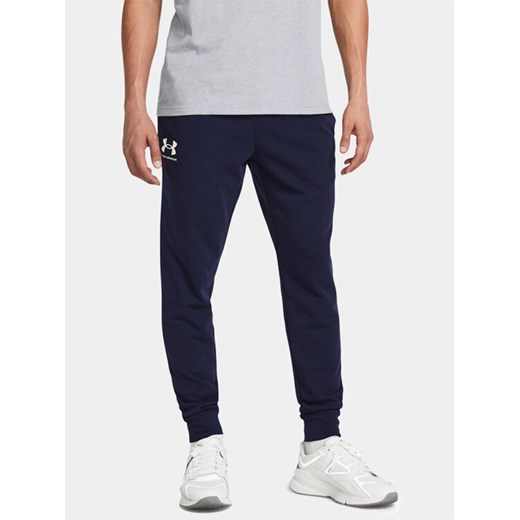 Under Armour Spodnie dresowe Ua Rival Terry Jogger 1380843-410 Granatowy Fitted Fit ze sklepu MODIVO w kategorii Spodnie męskie - zdjęcie 182617956